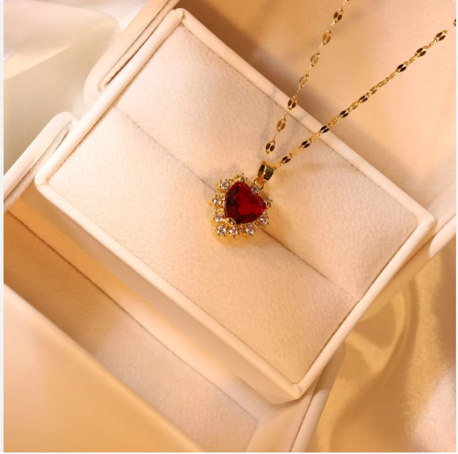 Gold Heart-Shaped Necklace with Brilliant Red